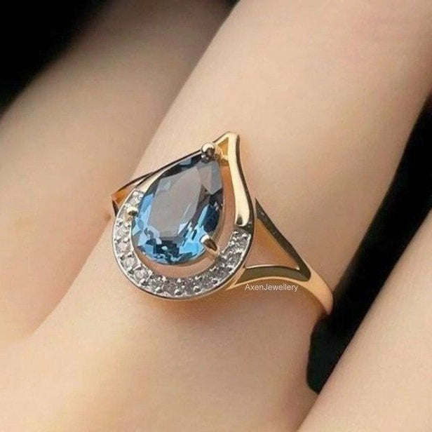 Blue Drop Orbit Gold Ring